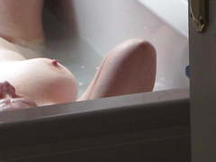 Spying on mature wife's large breast and nipple in the bath