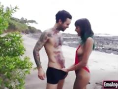Swimsuit clad Janice fucked by the beach