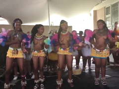Busty Zulu girls dancing topless at a ceremony