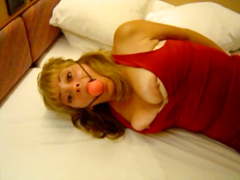 Abducted woman bound and gagged in pantyhose