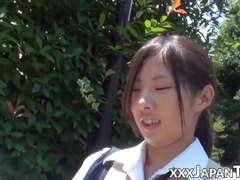 Nerdy Japanese schoolgirl with glasses teases in public